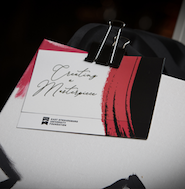 Detailed image of Creating a Masterpiece event invitation.